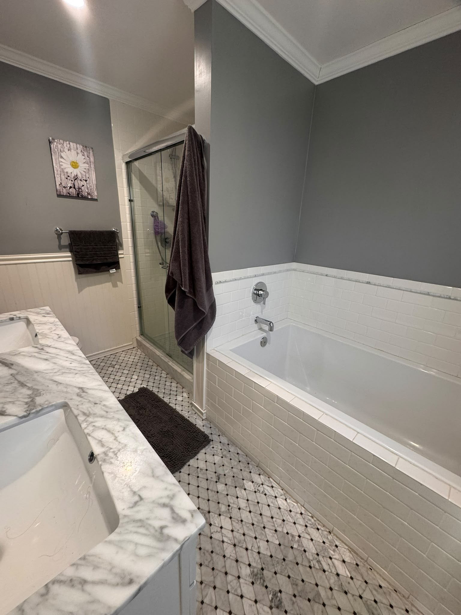 En-suite bathroom with a soaking tub and separate glass shower